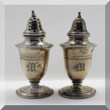 S49. Pair of weighted sterling silver shakers monogrammed ”M” 4.75”h - $42 